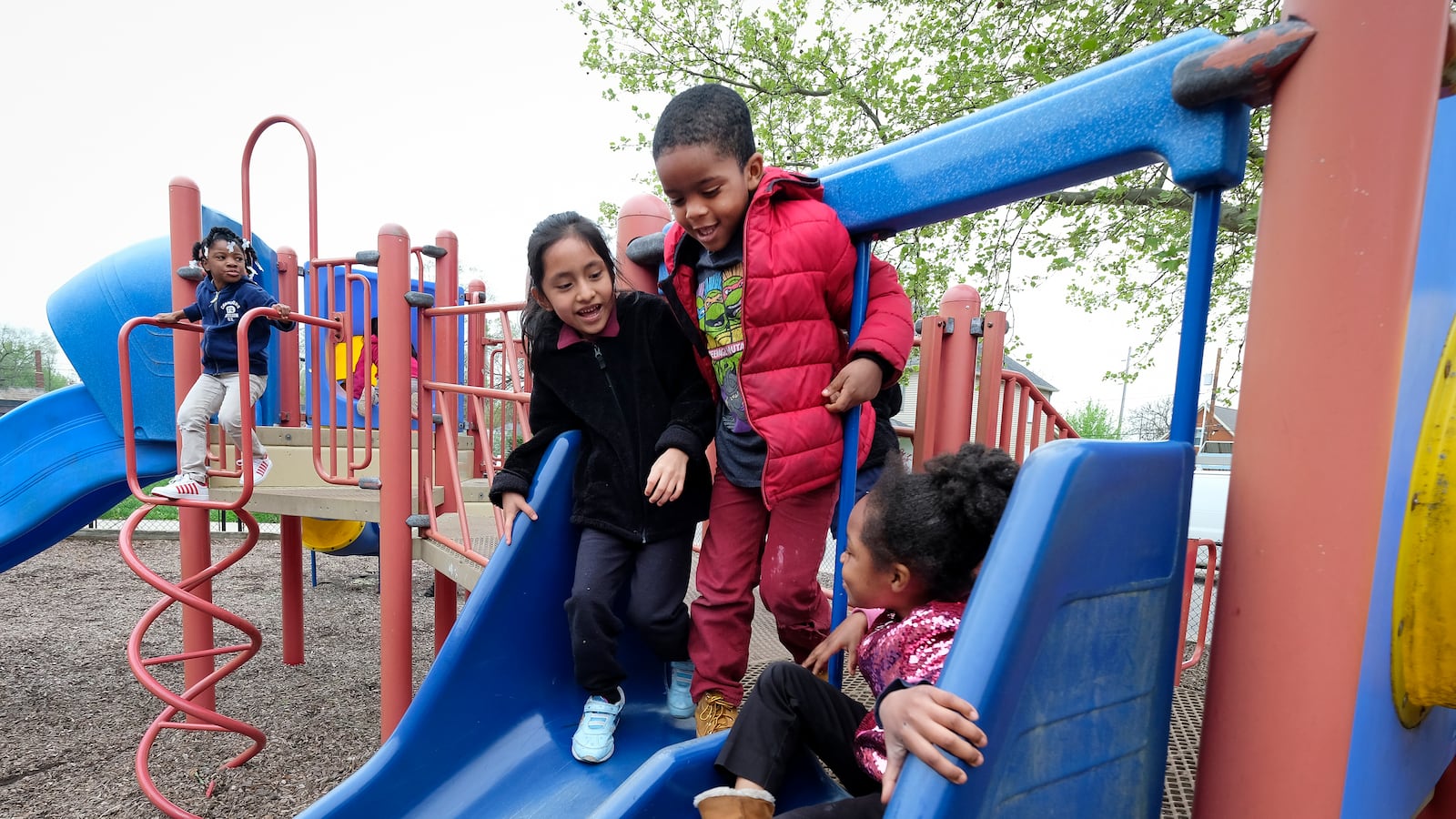 Students play on the playground at Thomas Gregg Neighborhood School, an elementary school in Indianapolis, Indiana.
