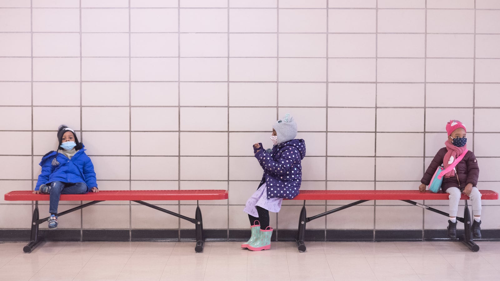 Preschool students sit on benches at Phyl’s Academy in Brooklyn in March 2021. Michael Appleton/Mayoral Photography Office