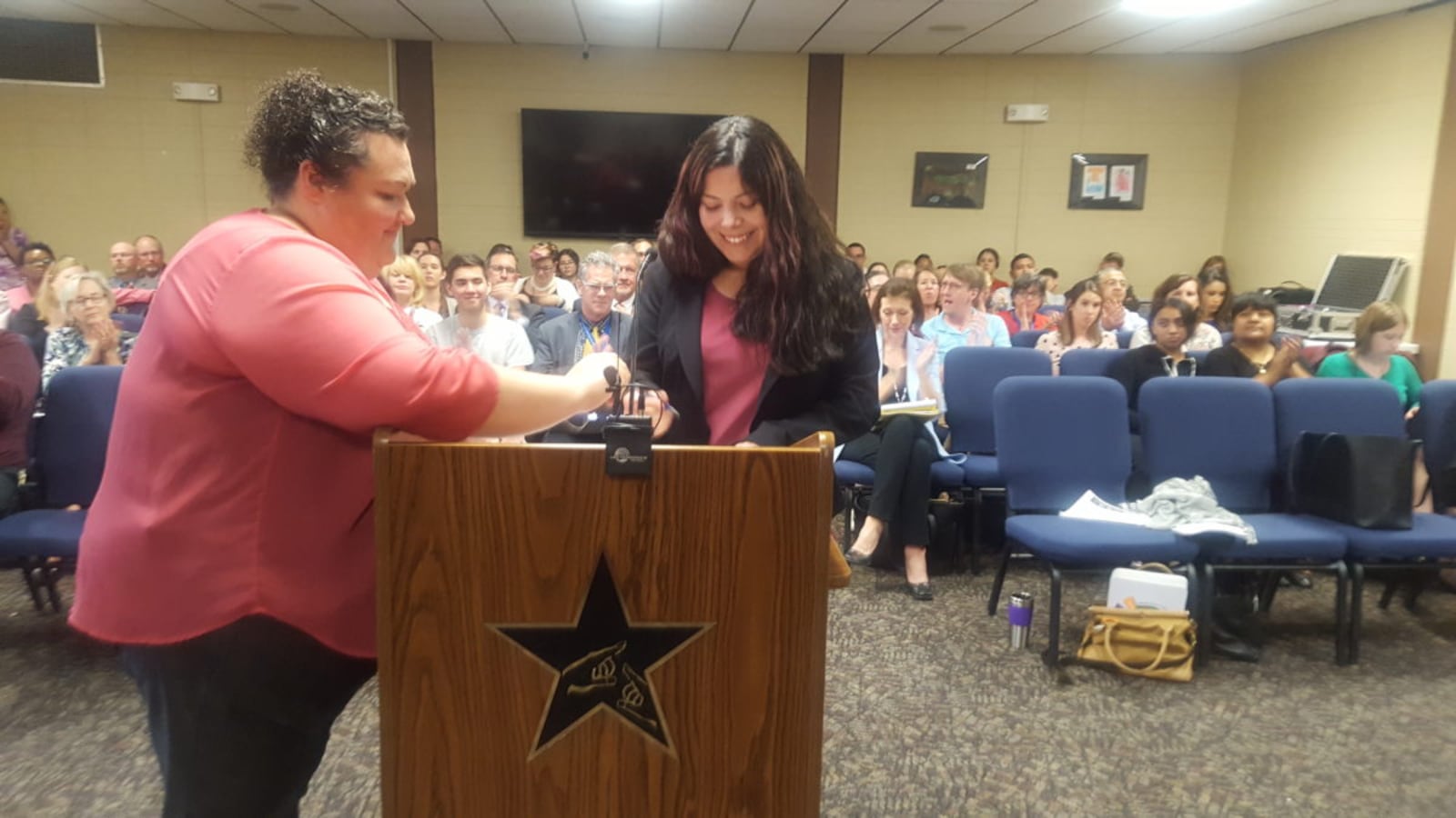 Laura Martinez, on the right, was sworn in as a member of the Adams 14 school board.