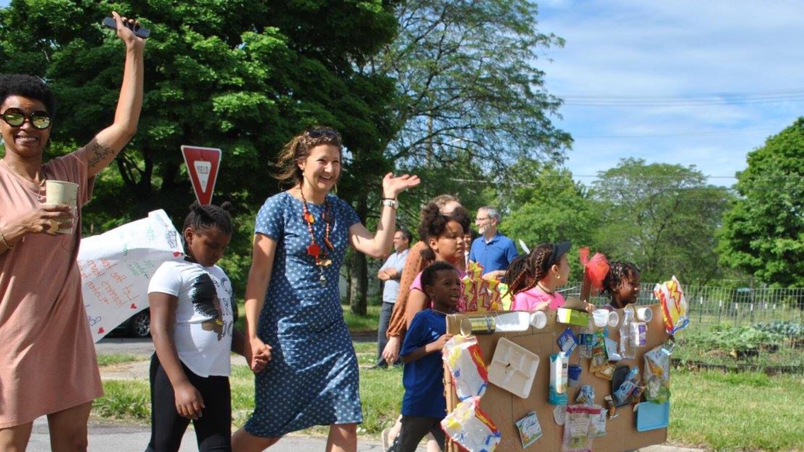 Teacher Kelly Rickert of the James and Grace Lee Boggs school, leads her students, wearing an incinerator costume, in a parade as part of lesson on trash and pollution.