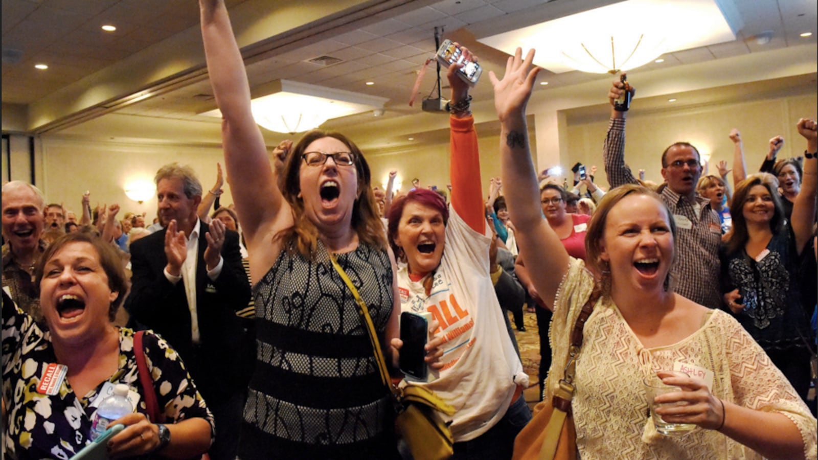 Recall supporters react as the news was announced that the embattled school board majority conceded.