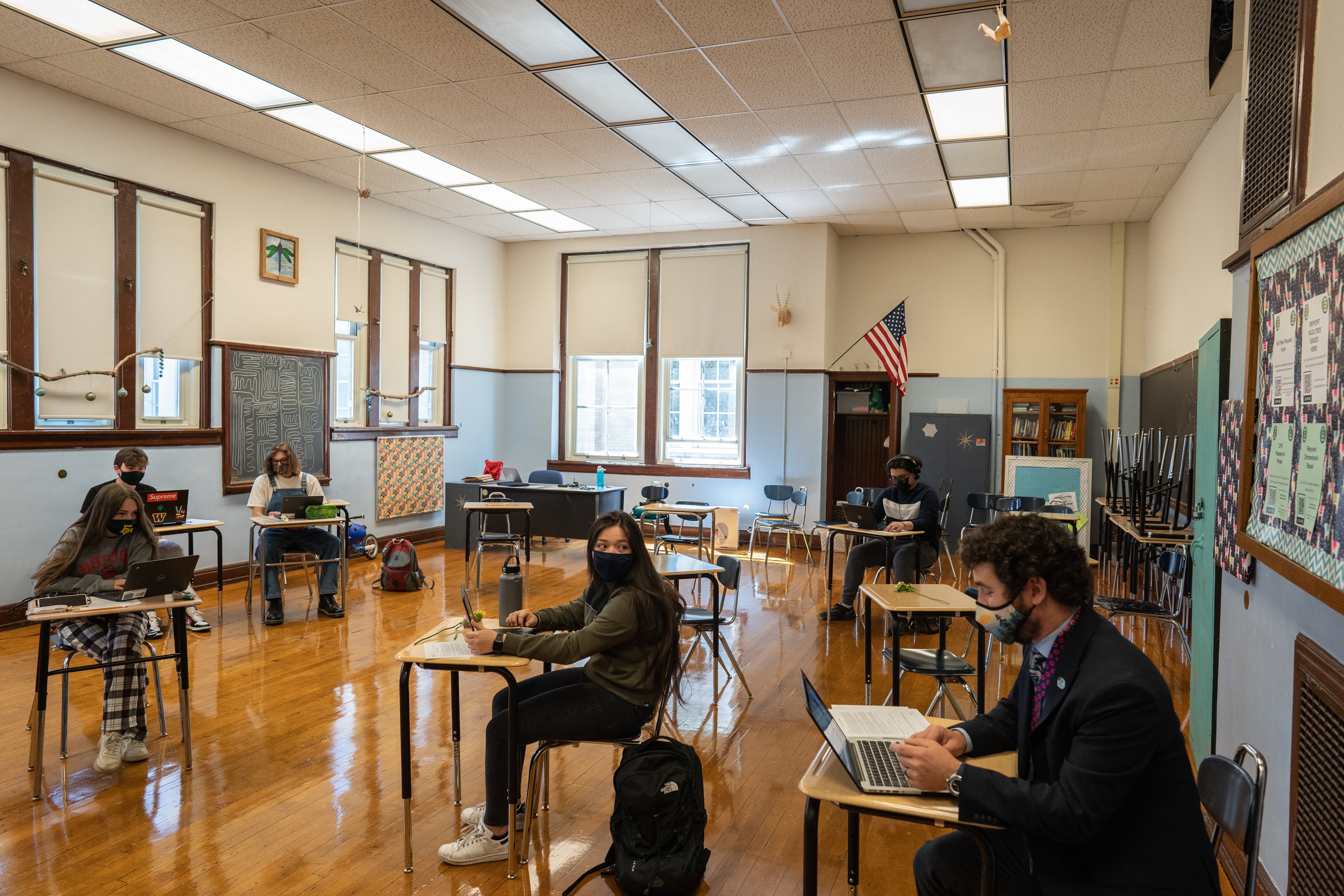 Senn High School seniors attend a history class on the first week back to classrooms for students on April 23, 2021.