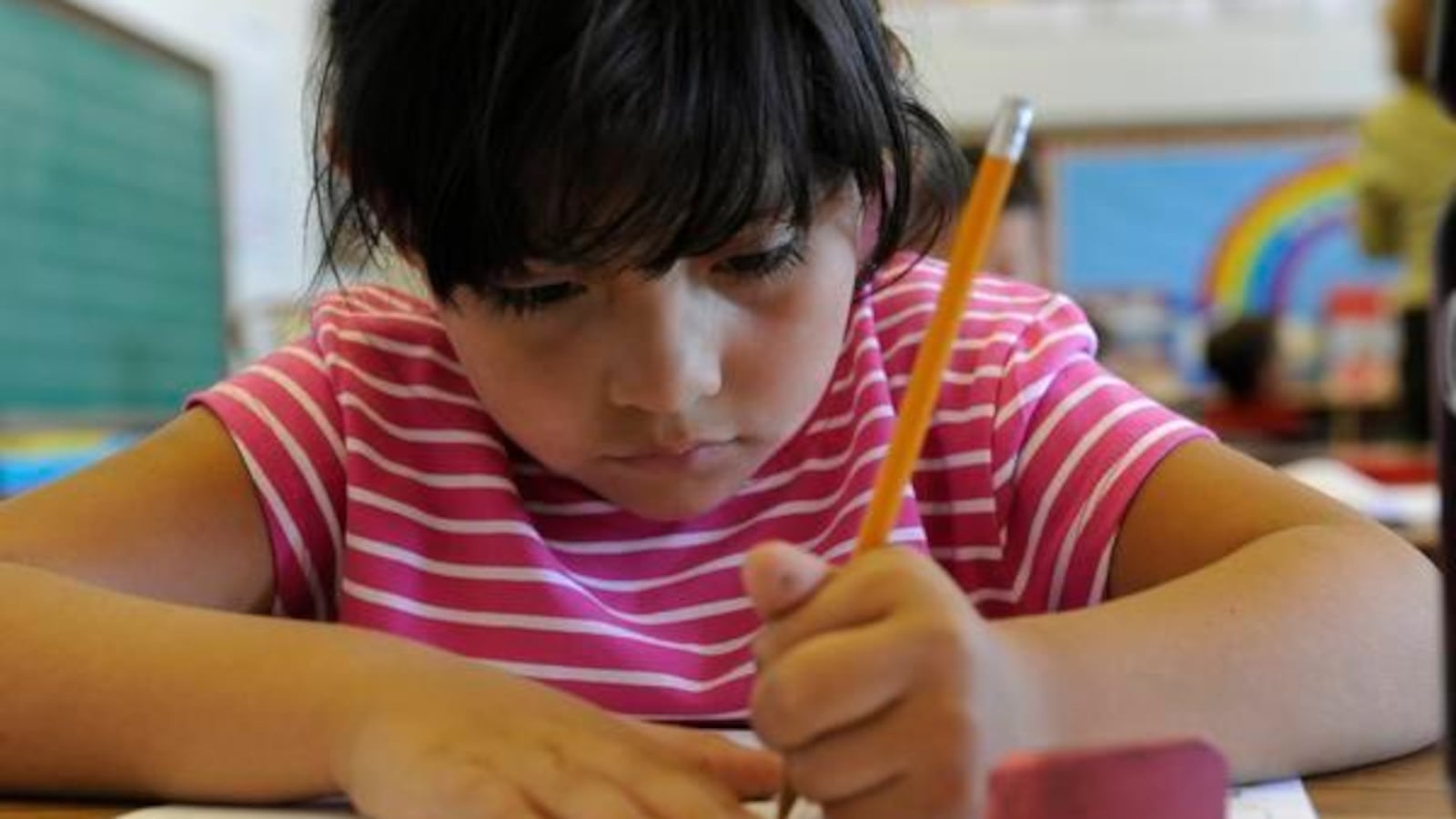 A Lincoln Elementary student practices her writing skills in this 2008 file photo.