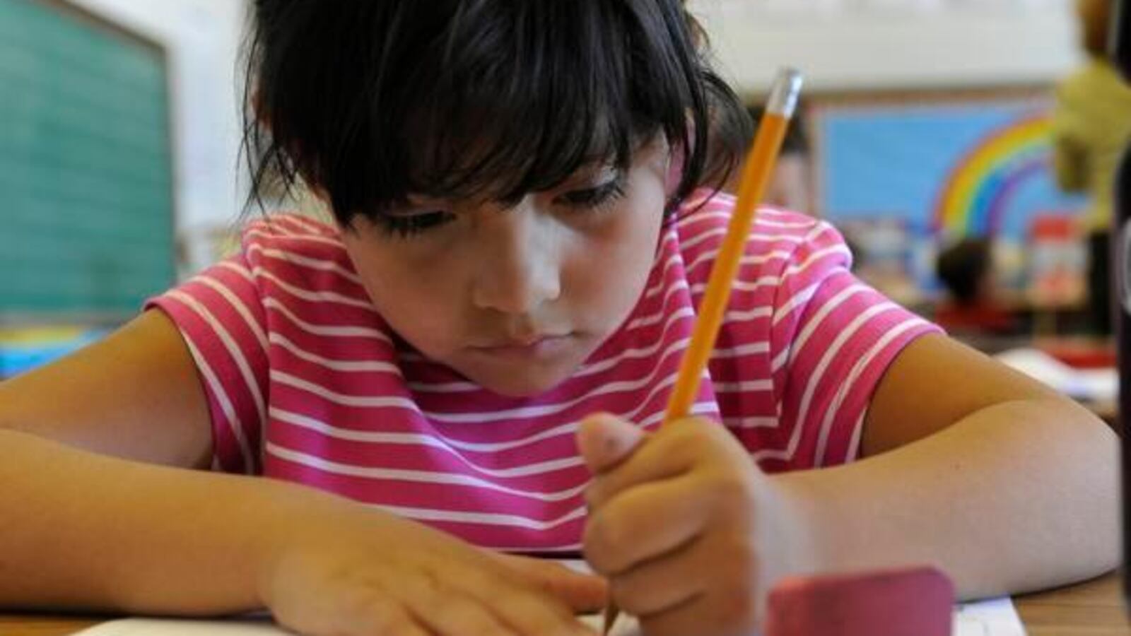 A Lincoln Elementary student practices her writing skills in this 2008 file photo.