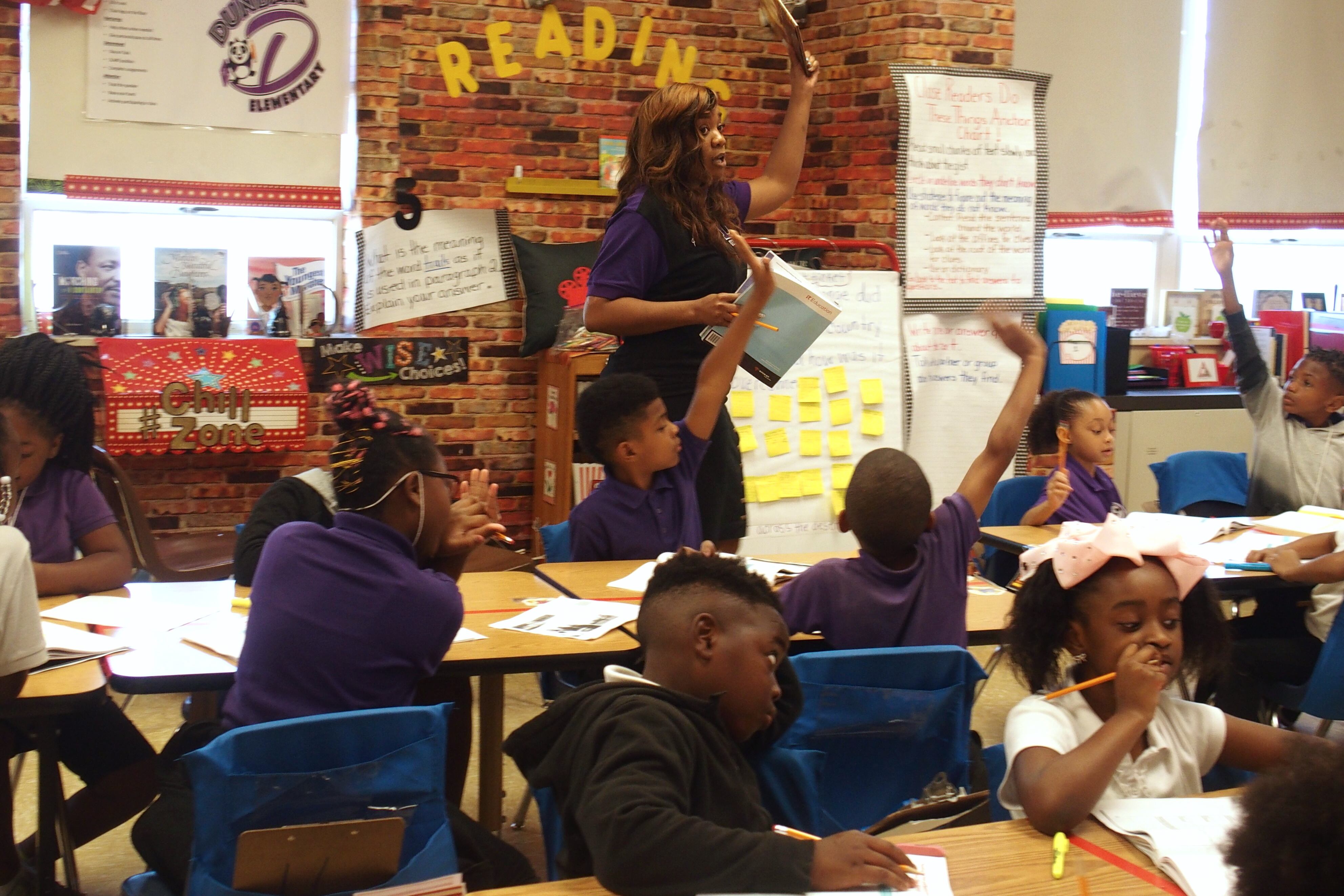 Taurus Brazil, a third grade English teacher at Dunbar Elementary School.