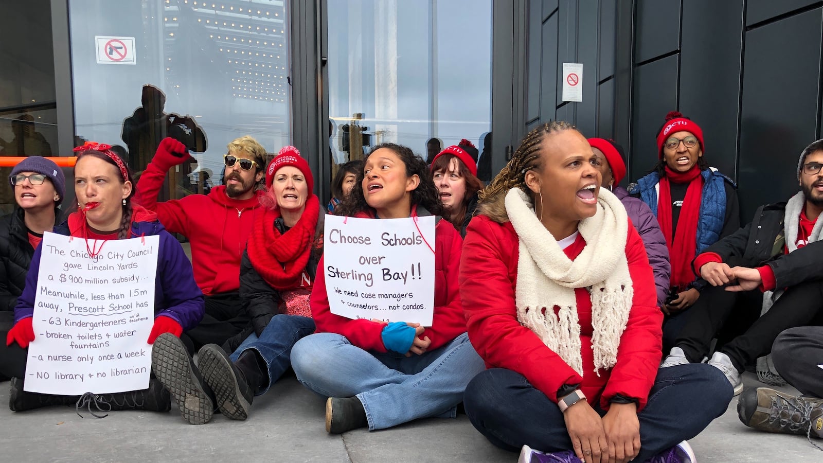 About 40 CTU members protested outside the West Loop headquarters of Lincoln Yards developer Sterling Bay on the ninth day of a citywide teacher strike. The teachers sought to deliver a letter highlighting the use of tax incentives for the development.
