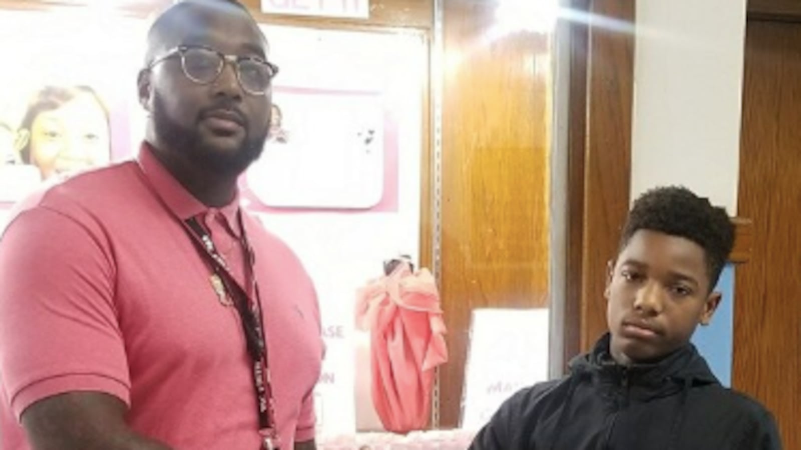 Thomas Fields (left), Paul Robeson Malcolm X Academy’s school culture facilitator, with a student. He passed away Monday due to coronavirus complications. Photo courtesy of Jeffery Robinson/Paul Robeson Malcolm X Academy