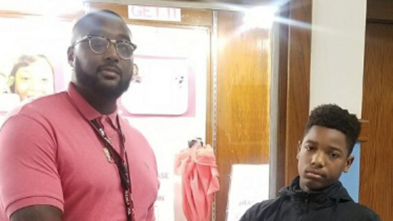 Thomas Fields (left), Paul Robeson Malcolm X Academy’s school culture facilitator, with a student. He passed away Monday due to coronavirus complications. Photo courtesy of Jeffery Robinson/Paul Robeson Malcolm X Academy