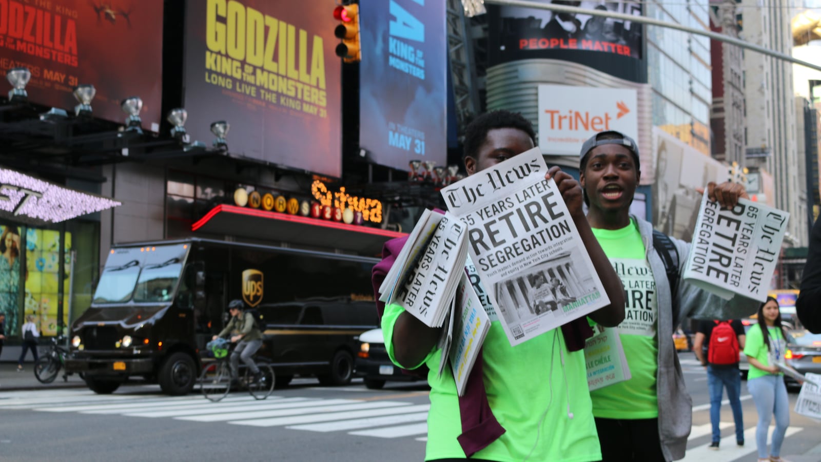 Teens with the advocacy group IntegateNYC took to Times Square to hand out newspapers filled with students' own stories about school segregation to mark the anniversary of Brown v. Board of Education. The group is one of many that provided input for the School Diversity Advisory Group recommendations.