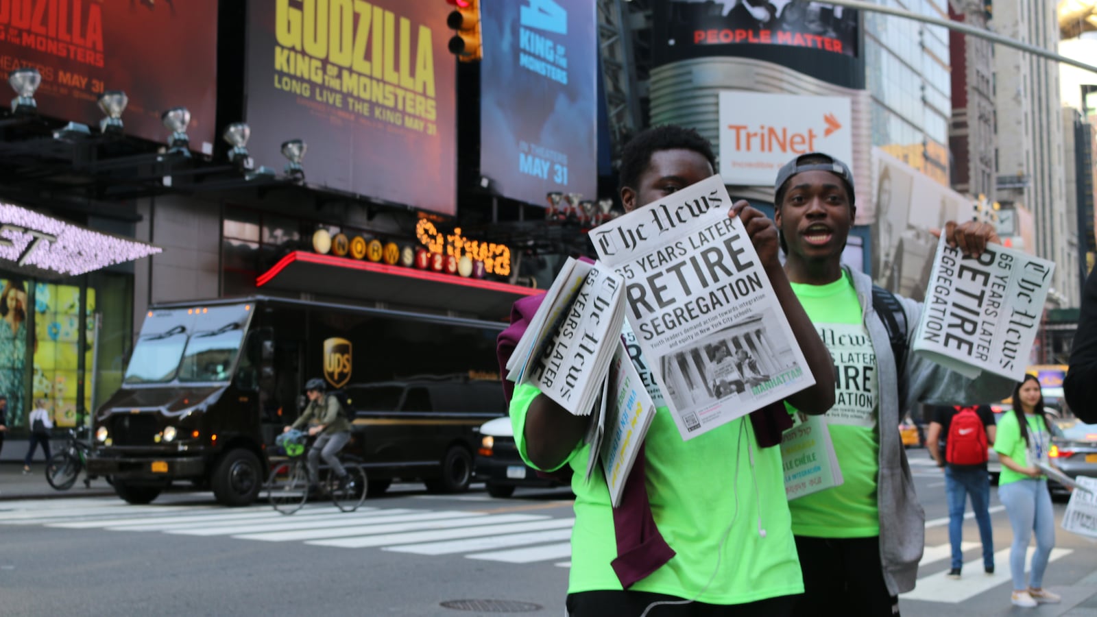 Teens with the advocacy group IntegateNYC took to Times Square to hand out newspapers filled with students' own stories about school segregation to mark the anniversary of Brown v. Board of Education. The group is one of many that provided input for the School Diversity Advisory Group recommendations.