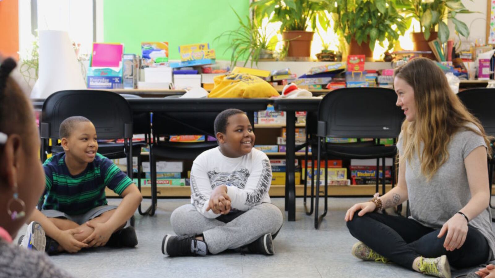 Homeless students participate in an afterschool reading club.