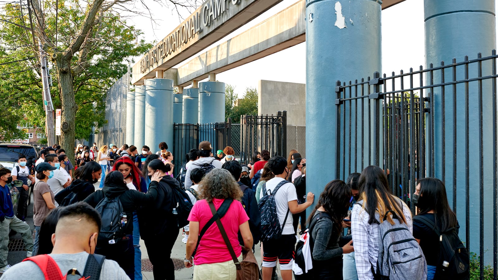 Students congregate at the entrance of Pan American High School on the first day of classes.