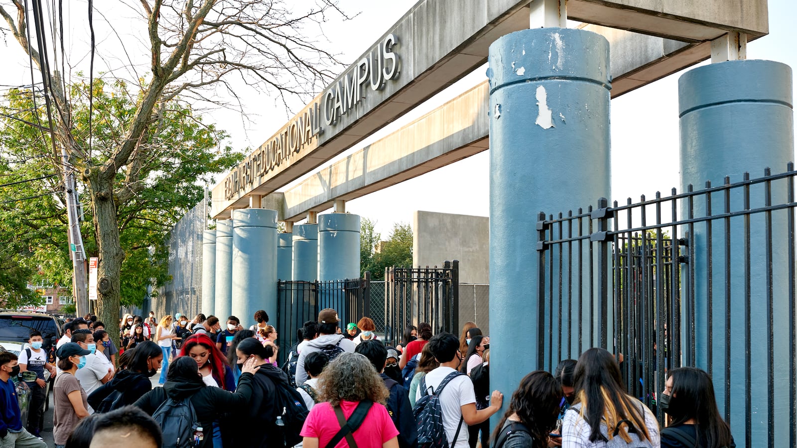 Students congregate at the entrance of Pan American High School on the first day of classes.