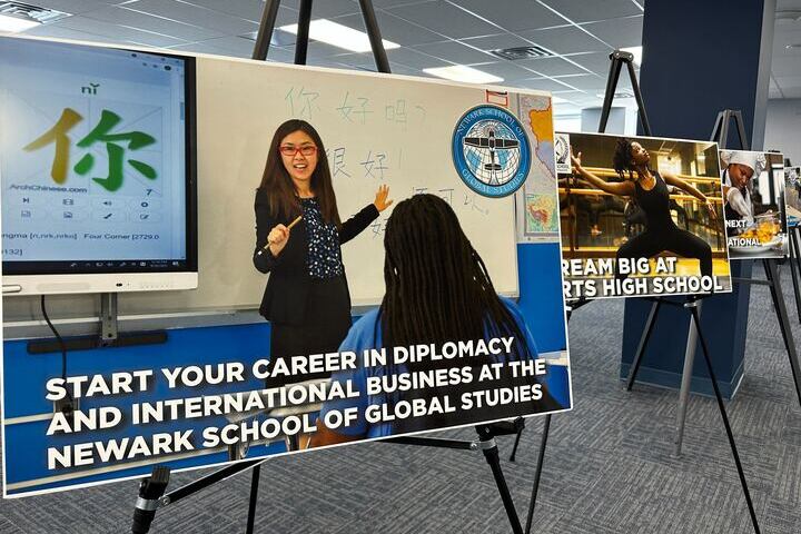 A sign promotes Newark’s School of Global Studies.