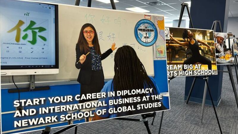 A sign promotes Newark’s School of Global Studies.
