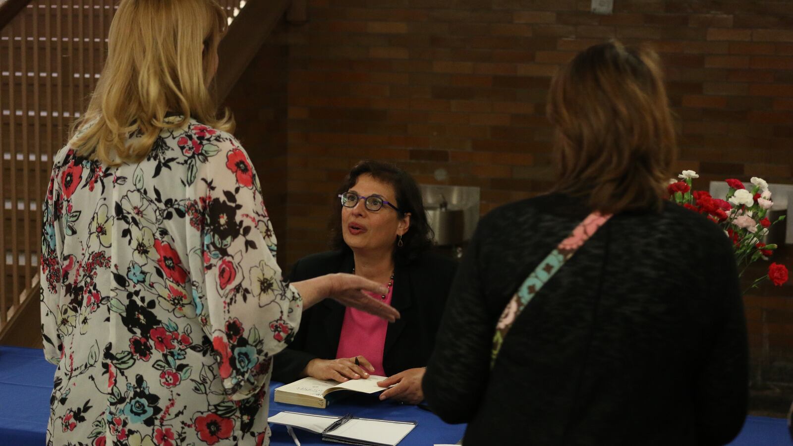 Sonia Nazario signed copies of her book Enrique’s Journey, adapted from a newspaper series, at an event Monday.
