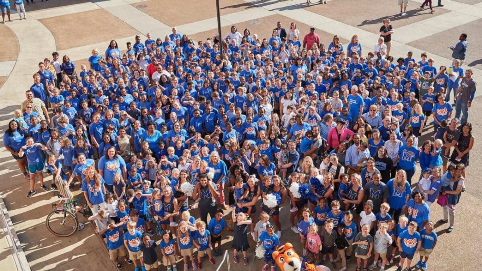 Students, parents, and staff at Campus School celebrate the beginning of a new school year with the University of Memphis' other campuses.