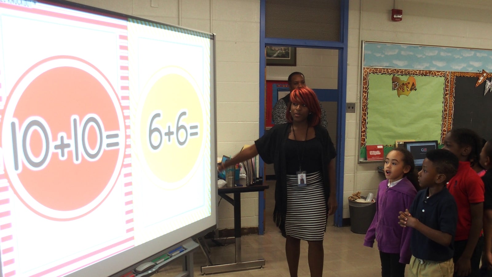 Students at Hawkins Mill Elementary play a math game during class.