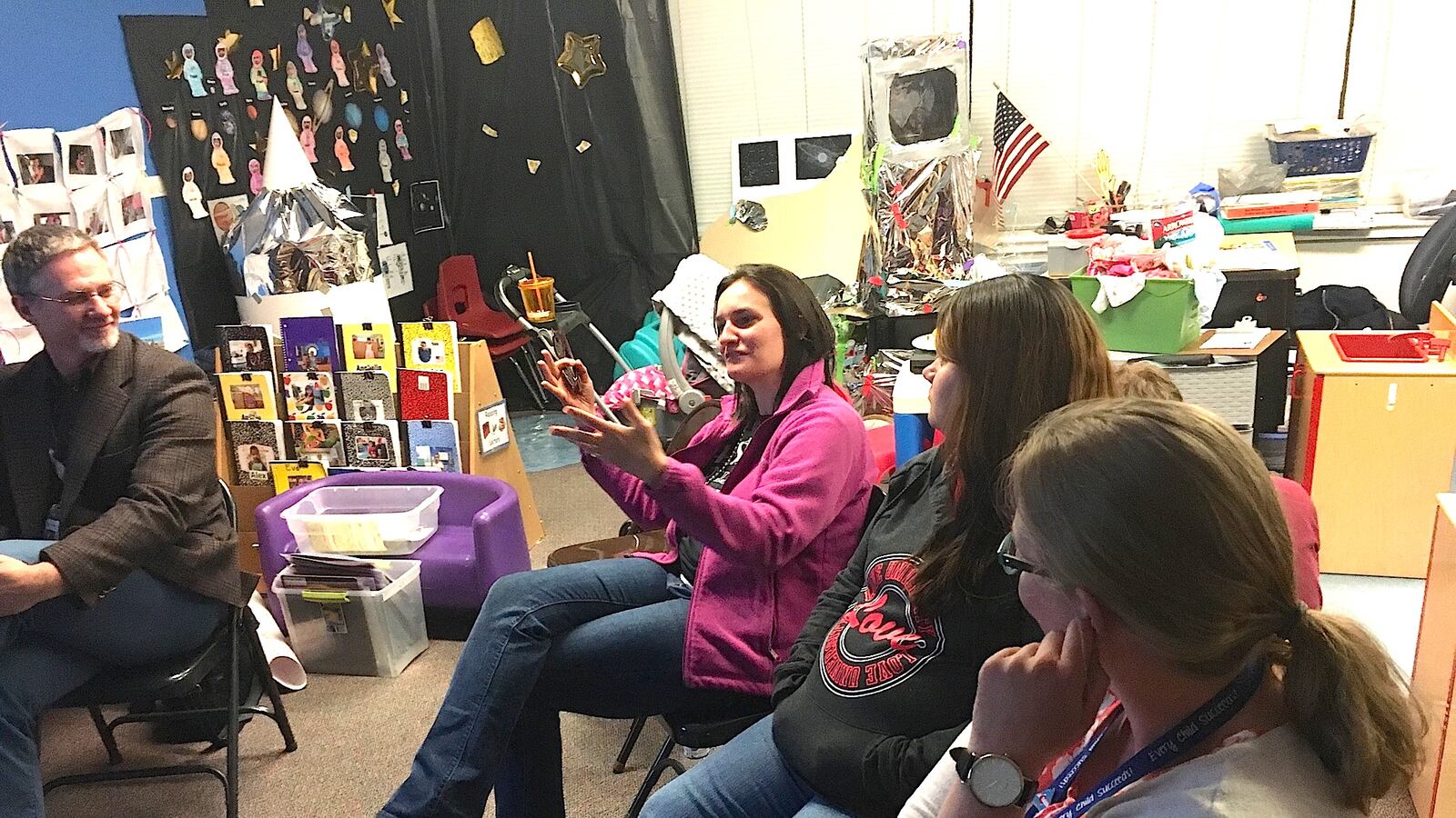 John Hicks, co-facilitator of a parenting class called "The Incredible Years" listens as participants discuss setting rules for their kids.