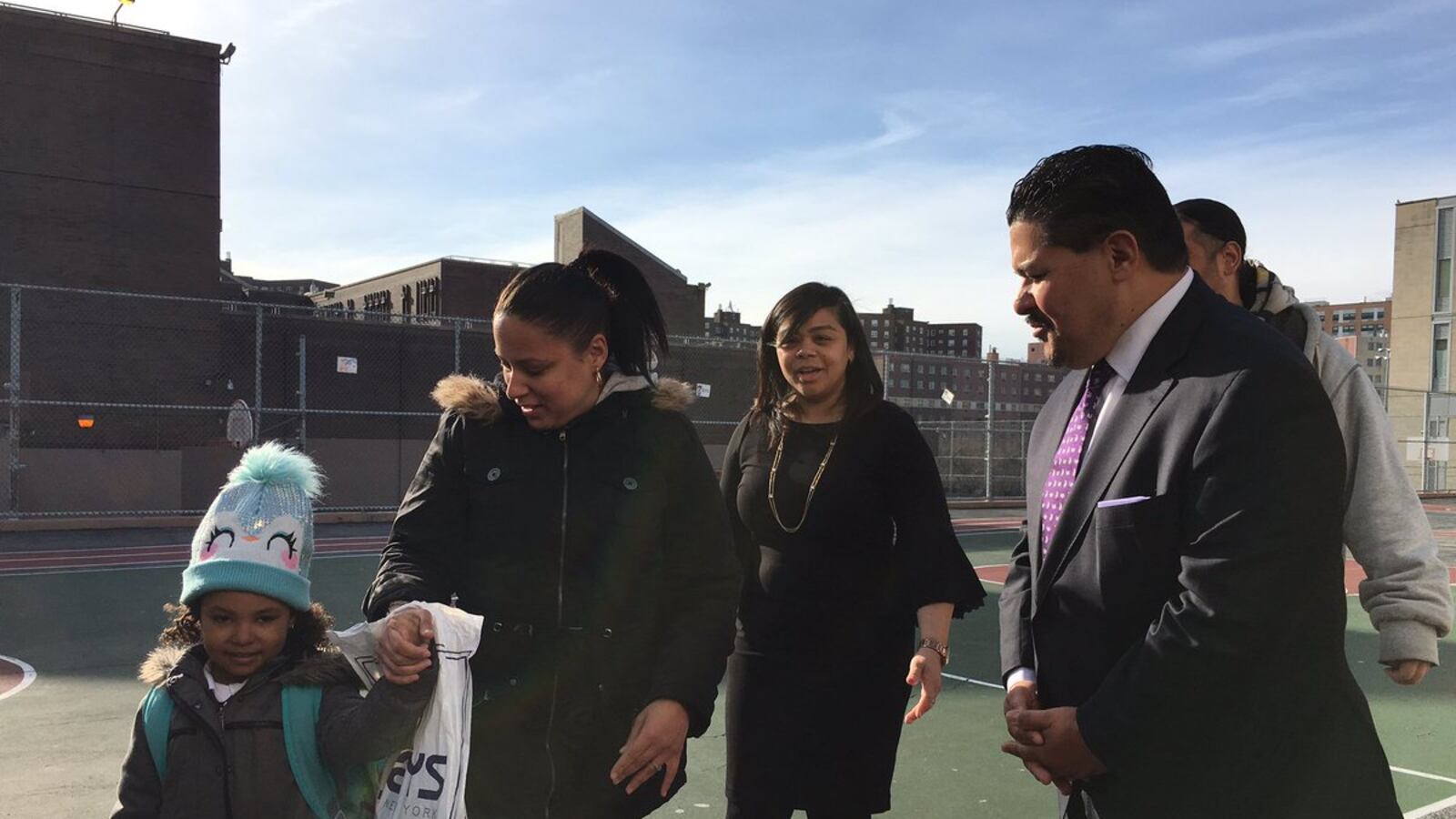 Chancellor Richard Carranza greeted families outside Concourse Village Elementary School in the Bronx on his first official school visit.
