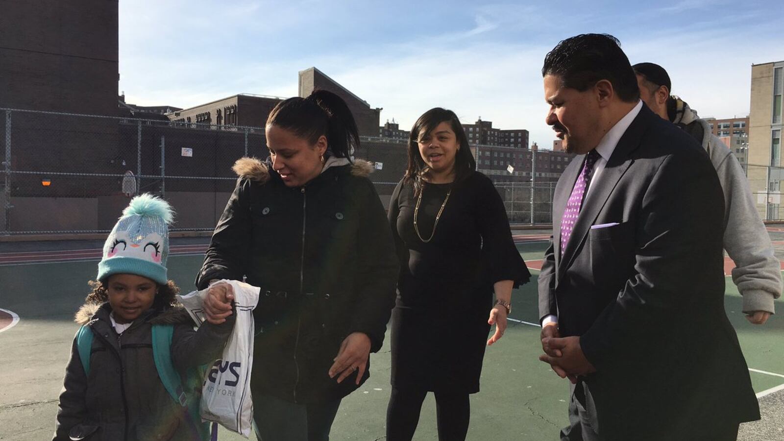 Chancellor Richard Carranza greeted families outside Concourse Village Elementary School in the Bronx on his first official school visit.