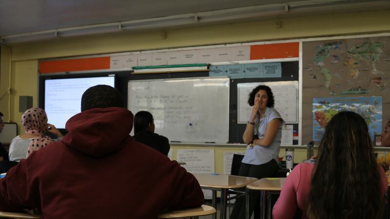 An English teacher chats about “The Crucible” with her class at ELLIS Prep Academy in the Bronx, a transfer school that serves immigrant students.