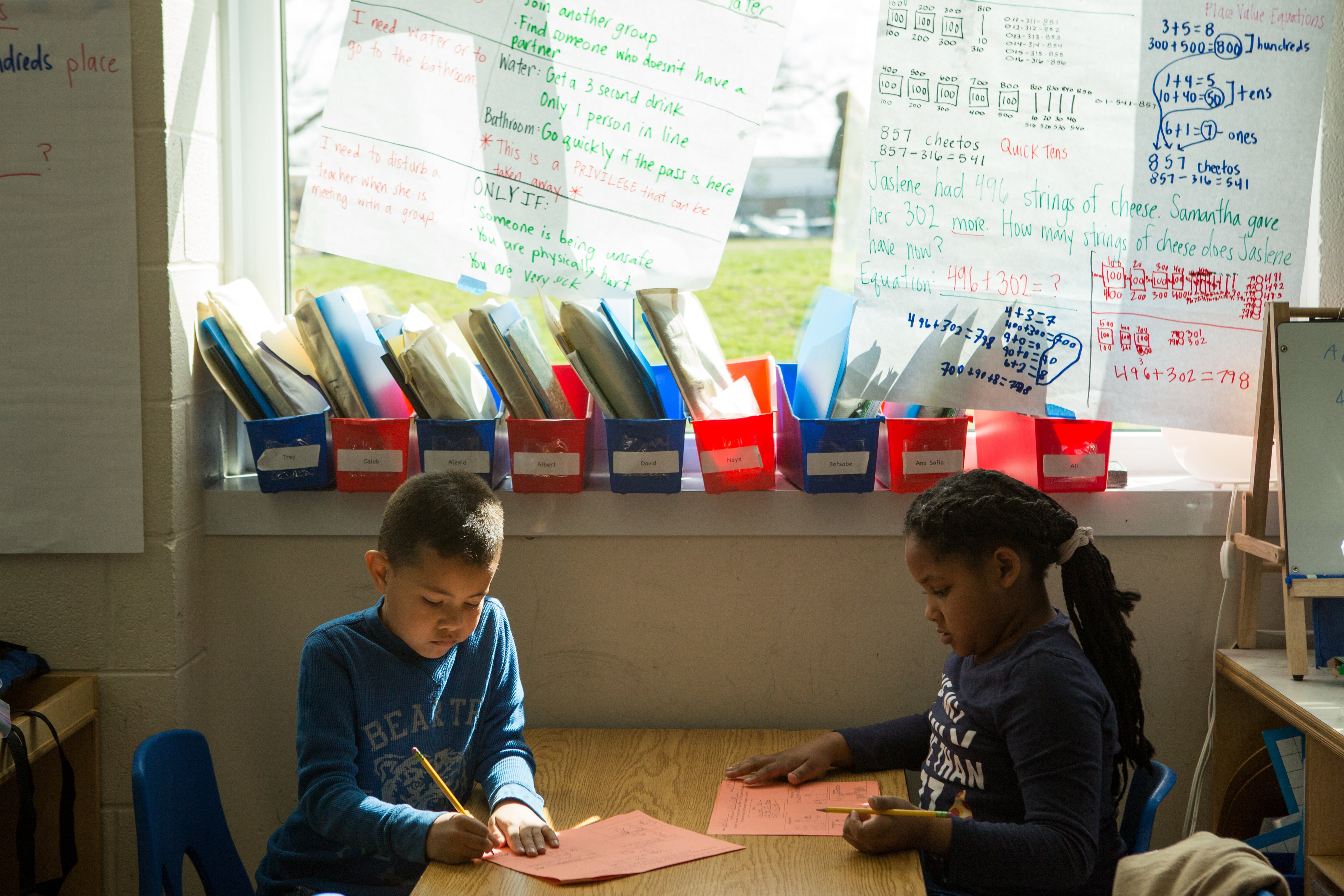 Second graders write and illustrate their own fables and folktales.