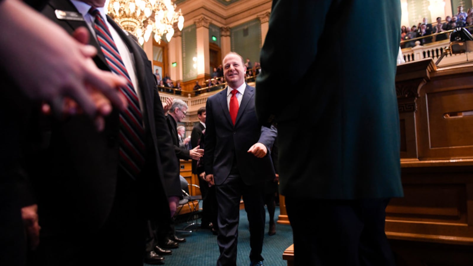Jared Polis is introduced on the House floor before delivering his first State of the State address.