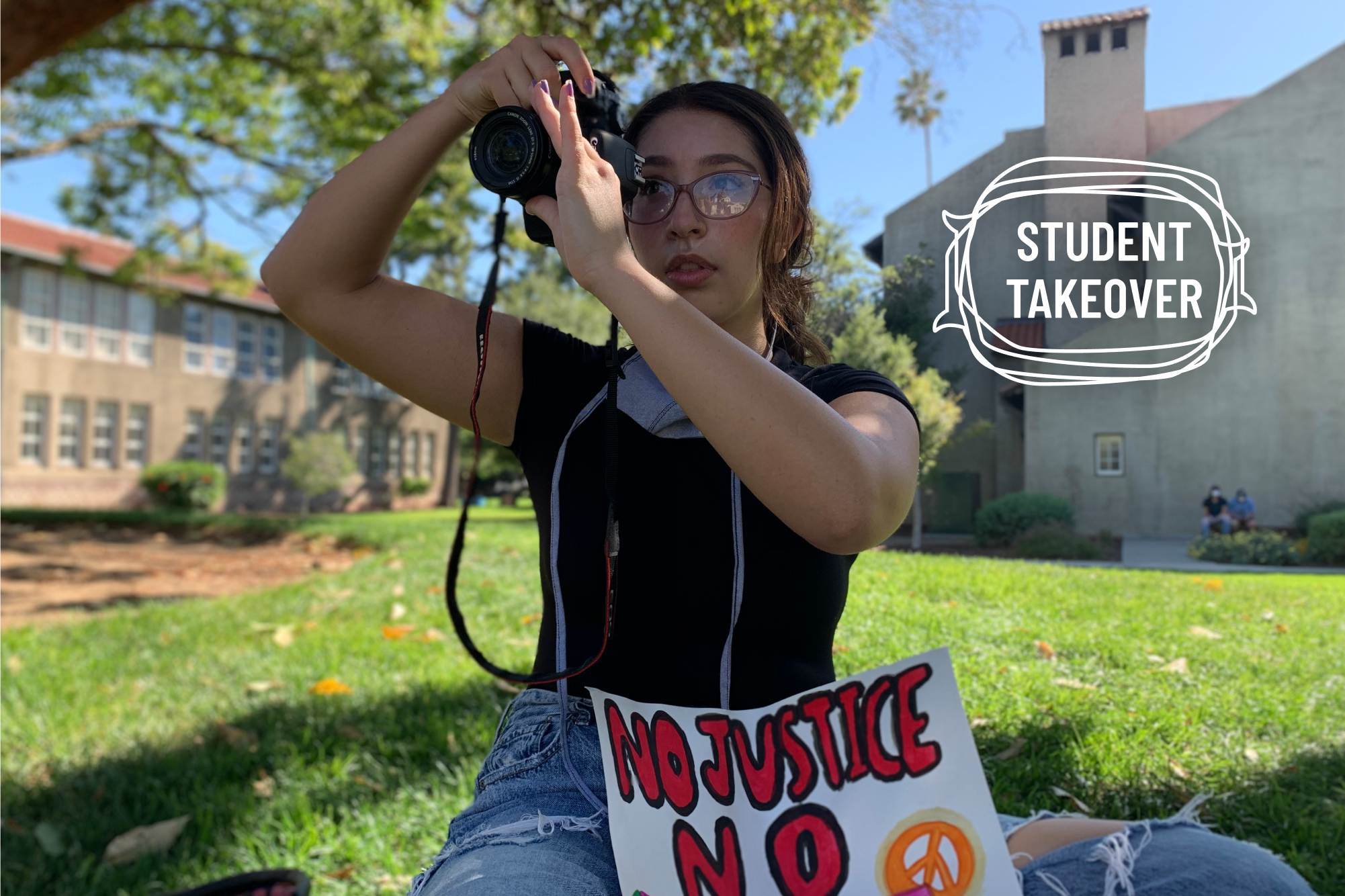 Andrea Saldana sits on a lawn at San Jose State University.