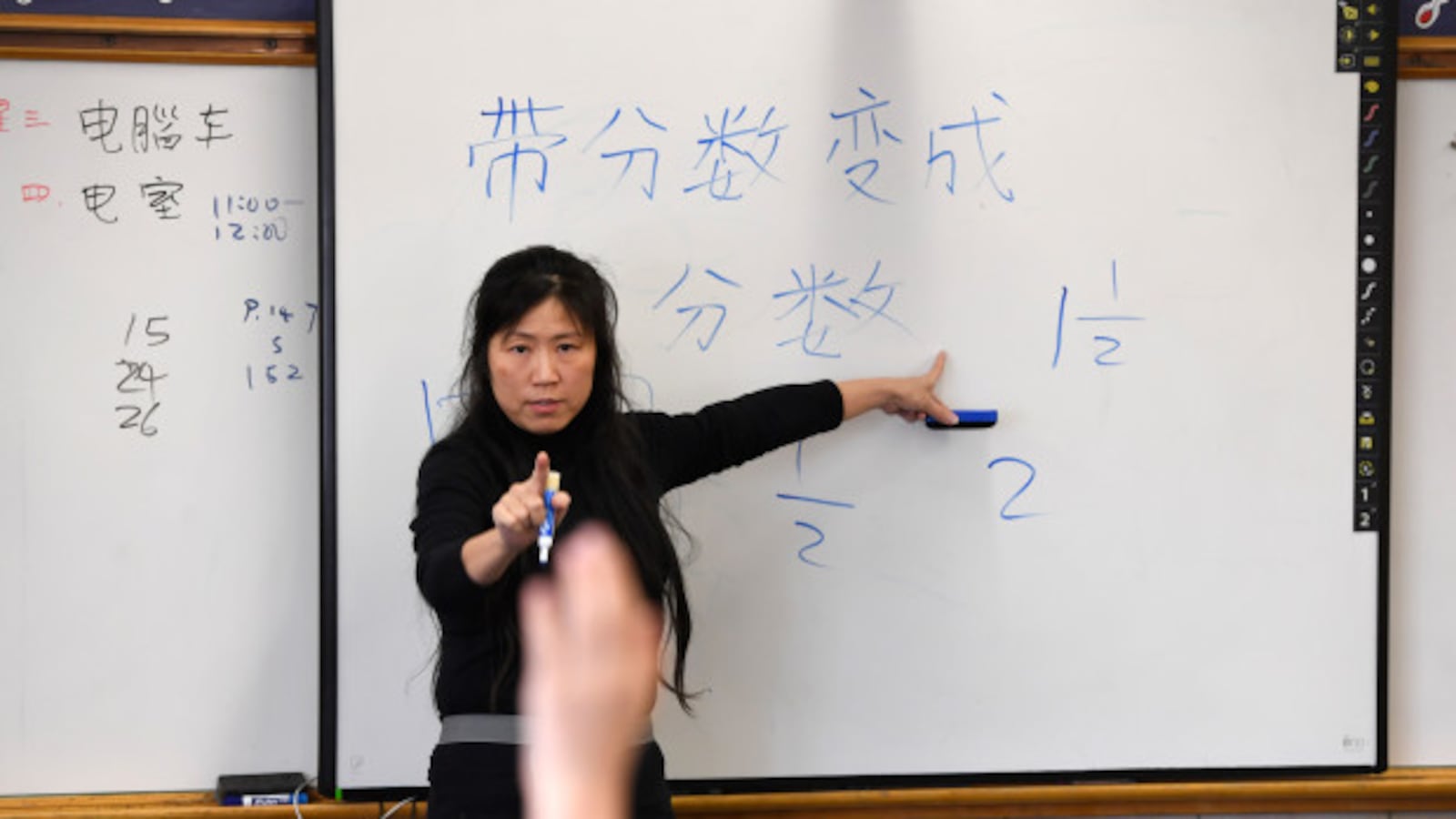 Chinese teacher Fay Tsai teaches her fourth grade class at Denver Language School.