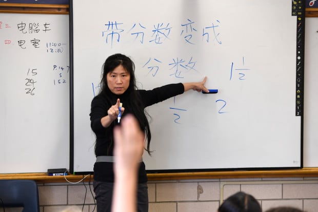 Chinese teacher Fay Tsai teaches her fourth grade class at Denver Language School.