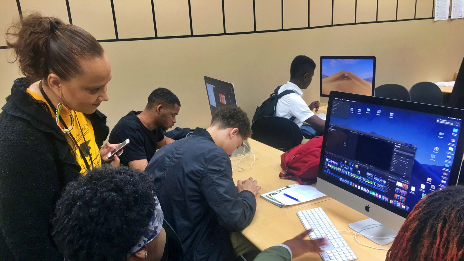 Detroit School of Arts Principal Mayowa Lisa Reynolds looks on during a June class.