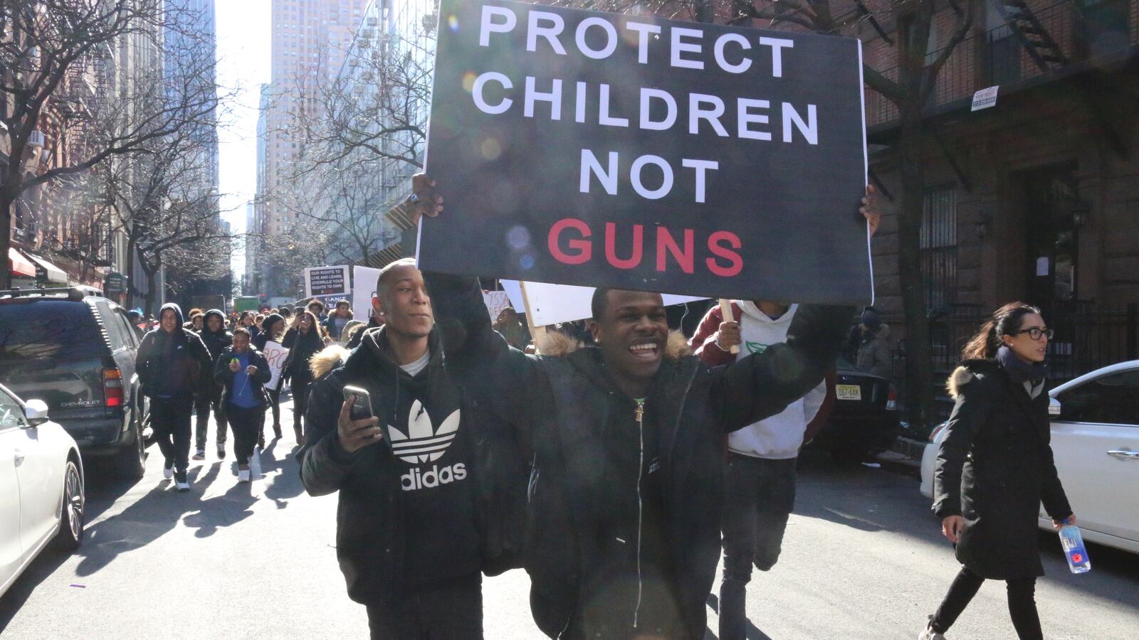 Students from the Urban Assembly Gateway School for Technology and Stephen T. Mather Building Arts Craftsmanship High School walked out Wednesday in New York City.