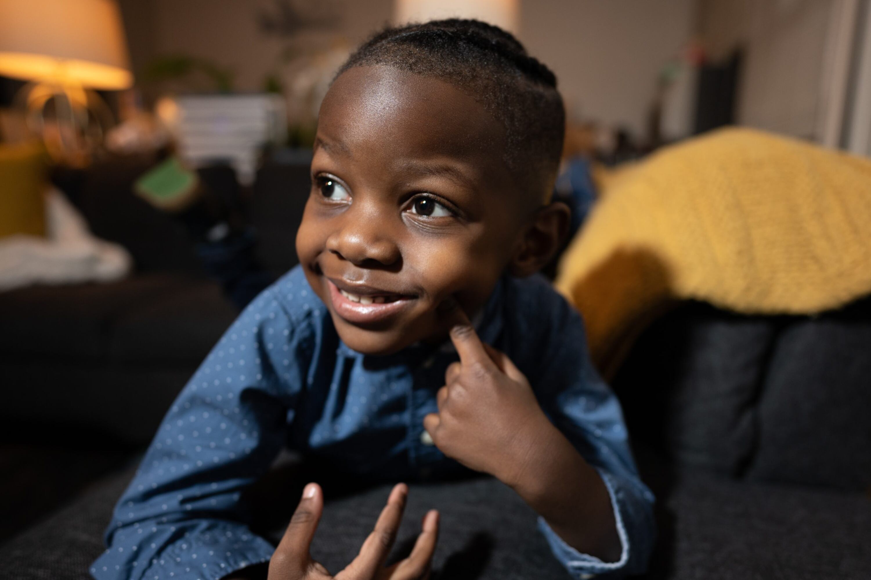 Gus “Jett” Hawkins poses for a portrait, donning his hair in braids, in his family’s Douglas home on Wednesday, March 17, 2021.