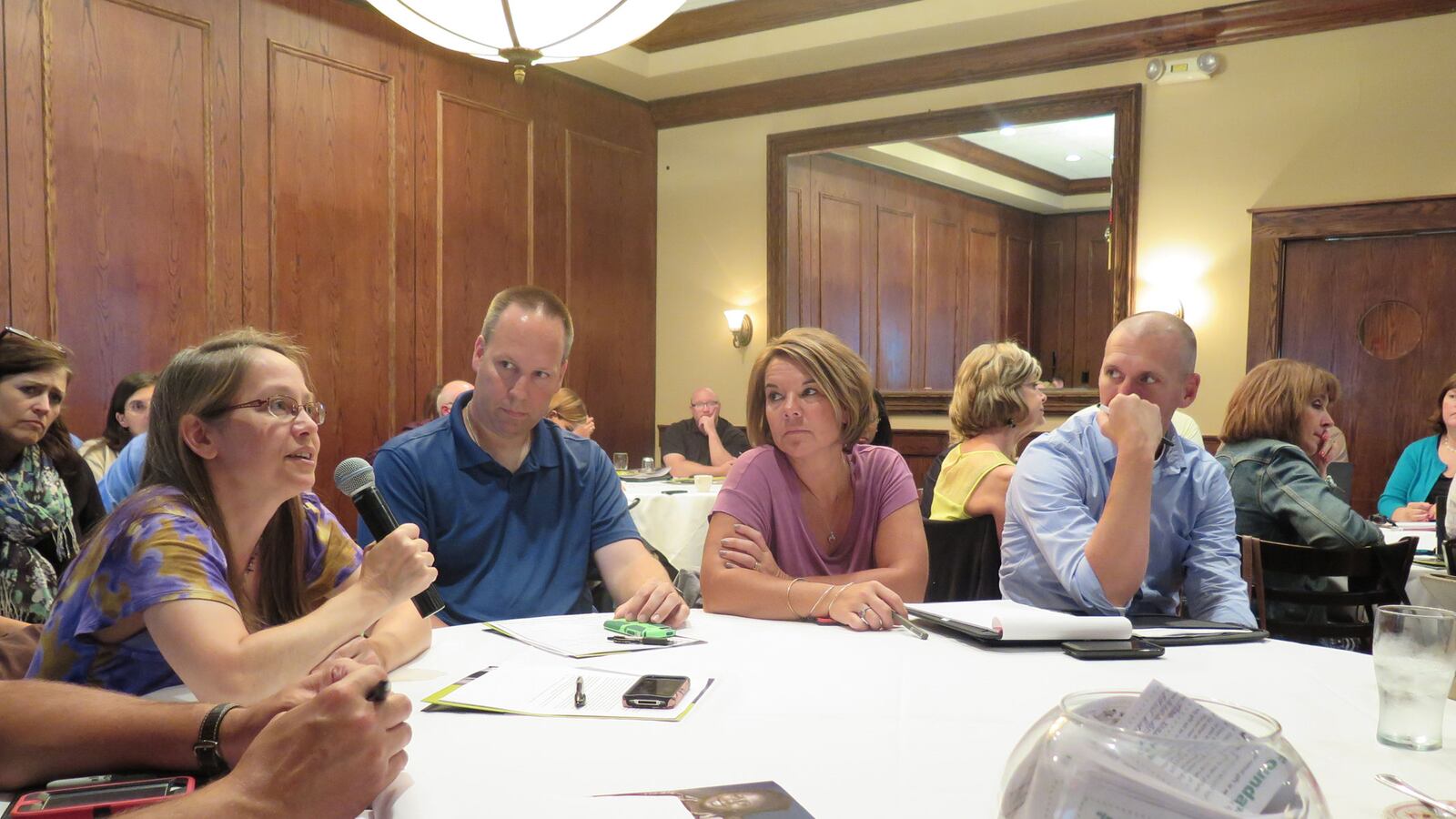 Helene Achgill, department chair for the information center at North Central High School, speaks during a presentation by IB regional director for the Americas Drew Deutsch on Tuesday afternoon.