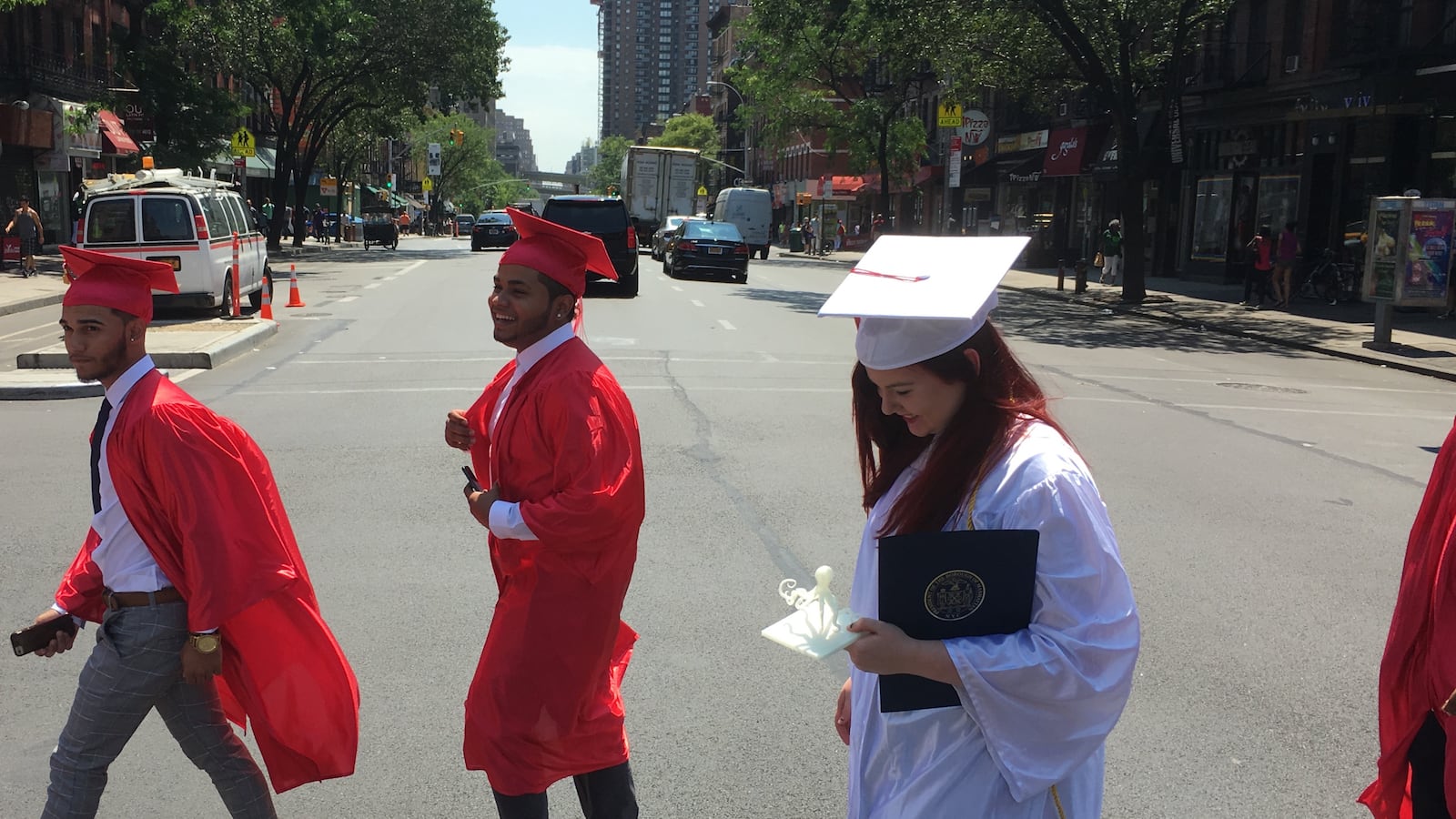 Leigh Duignan walks to graduation with classmates from The Urban Assembly Gateway School for Technology.