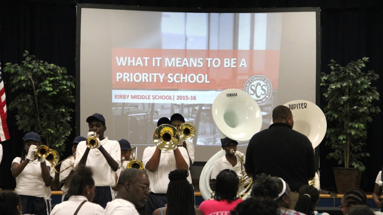 Kirby Middle School parents, students and supporters learn what it means to be a priority school, including eligibility to be removed by the state from local district control, during a community meeting organized in August by Shelby County Schools.
