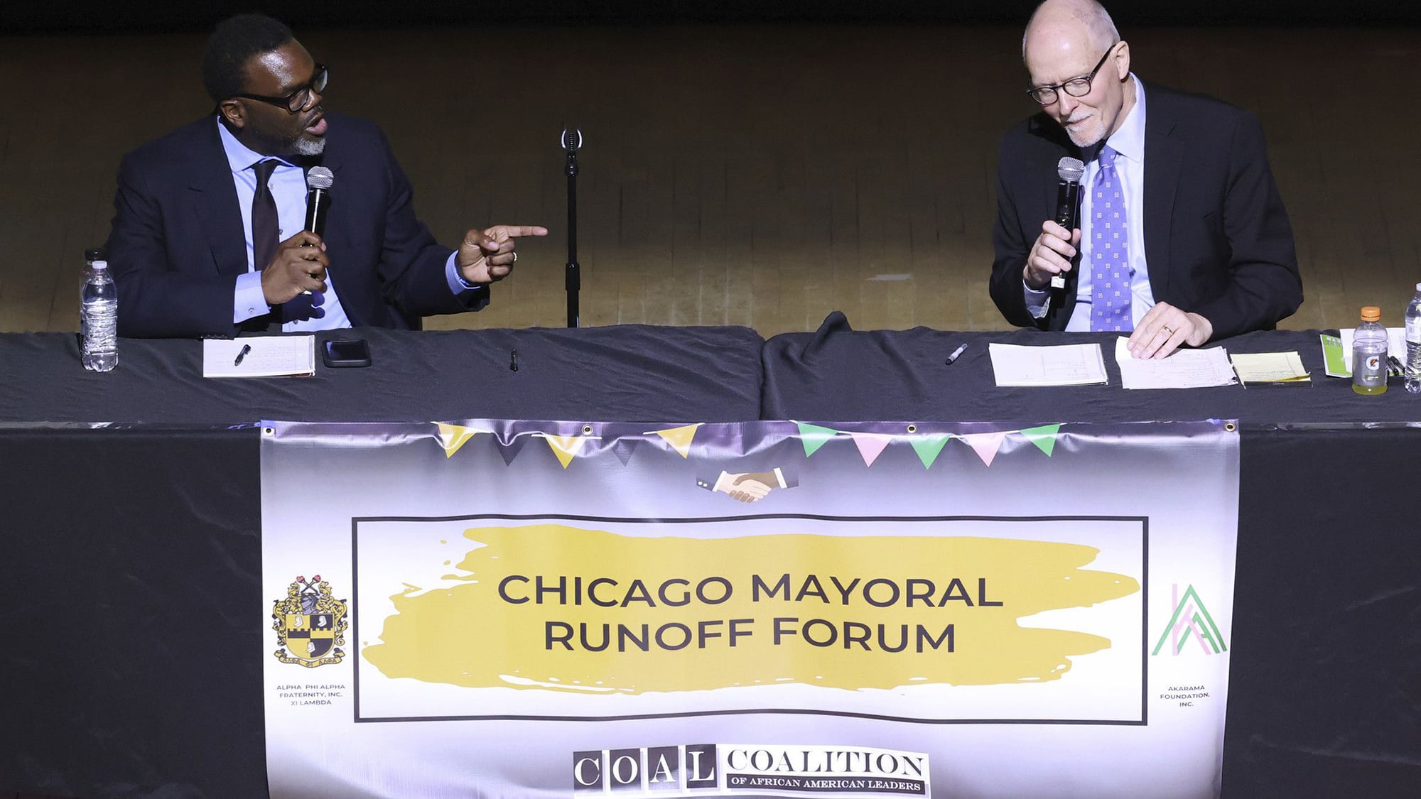 Cook County Commissioner Brandon Johnson (left) and former Chicago Public Schools CEO Paul Vallas (right) are running to be Chicago’s next mayor. 