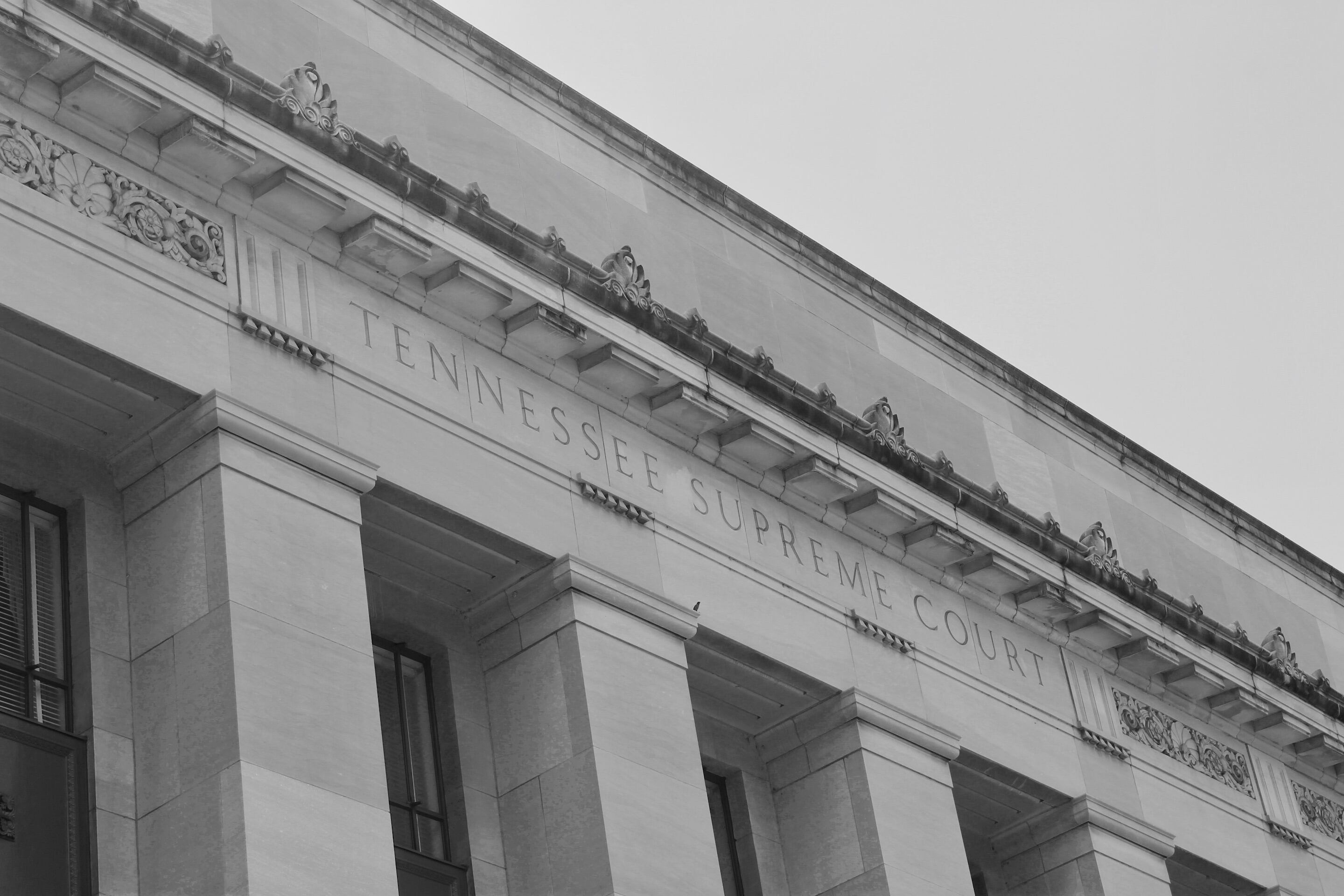 A large, multi-column building with “Tennessee Supreme Court” etched into the facade.