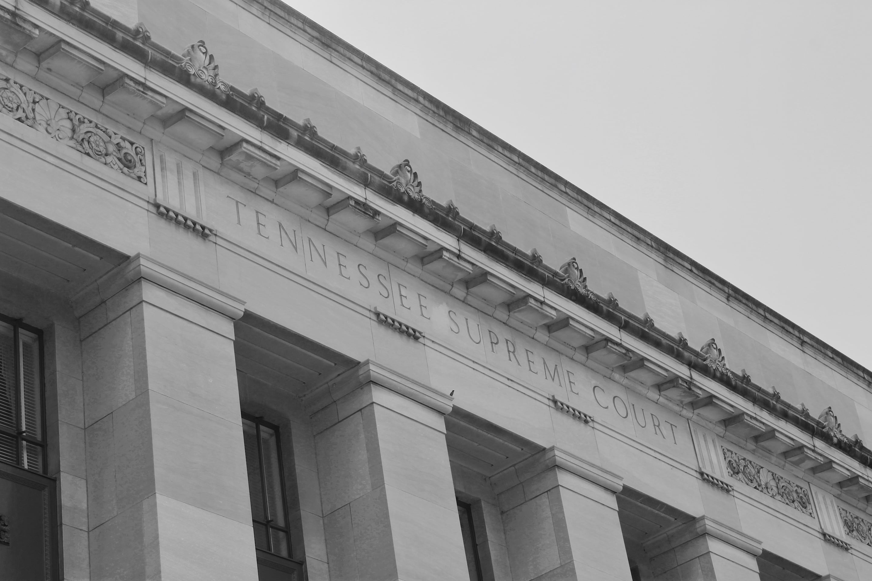 A large, multi-column building with “Tennessee Supreme Court” etched into the facade.