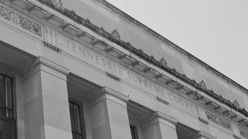 A large, multi-column building with “Tennessee Supreme Court” etched into the facade.