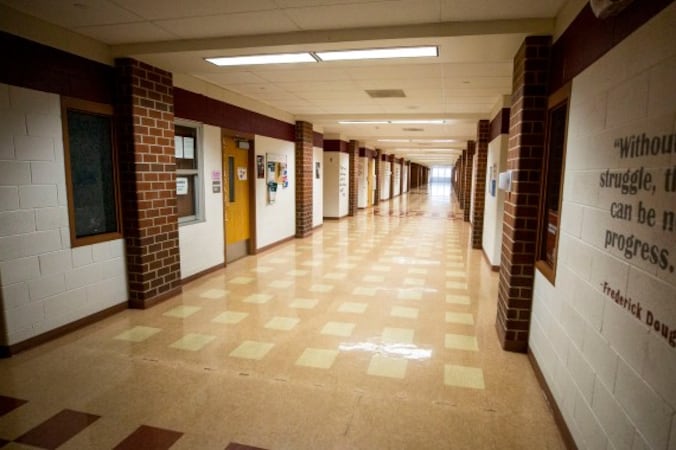 An empty high school hallway.