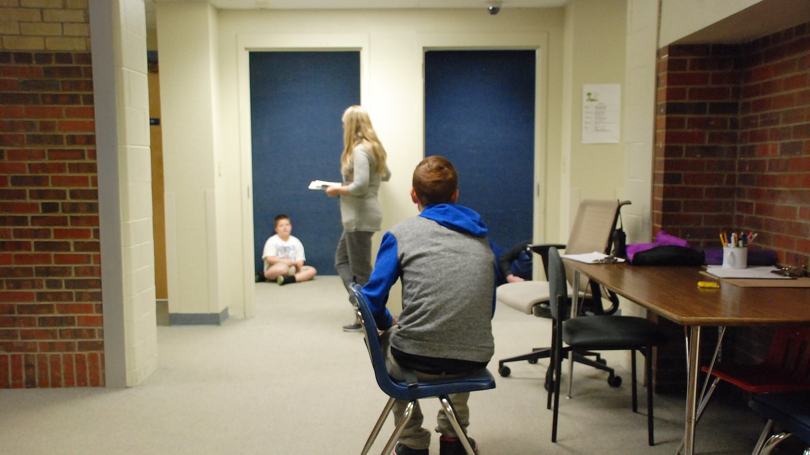 Students who need a break from class at the Sobesky Academy in Lakewood sit in "chill rooms" to refocus. On a recent morning, there were more students who wanted to use a chill room than the current campus allows, so one sat in the hall. School leaders hope a move to a larger facility will allow for more chill rooms.