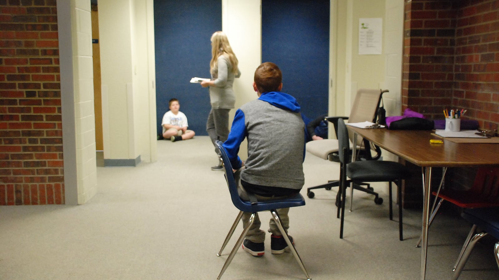 Students who need a break from class at the Sobesky Academy in Lakewood sit in "chill rooms" to refocus. On a recent morning, there were more students who wanted to use a chill room than the current campus allows, so one sat in the hall. School leaders hope a move to a larger facility will allow for more chill rooms.