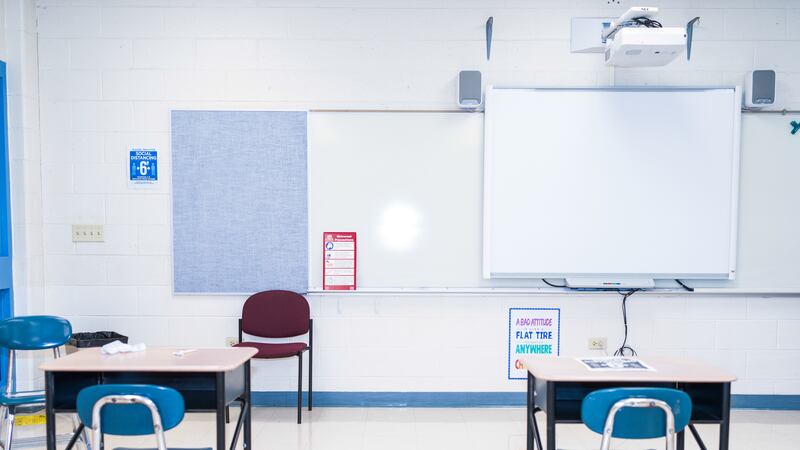 Empty desks and posters promoting social distancing at Lincoln Elementary in Dolton, Illinois, on Feb. 28, 2021.