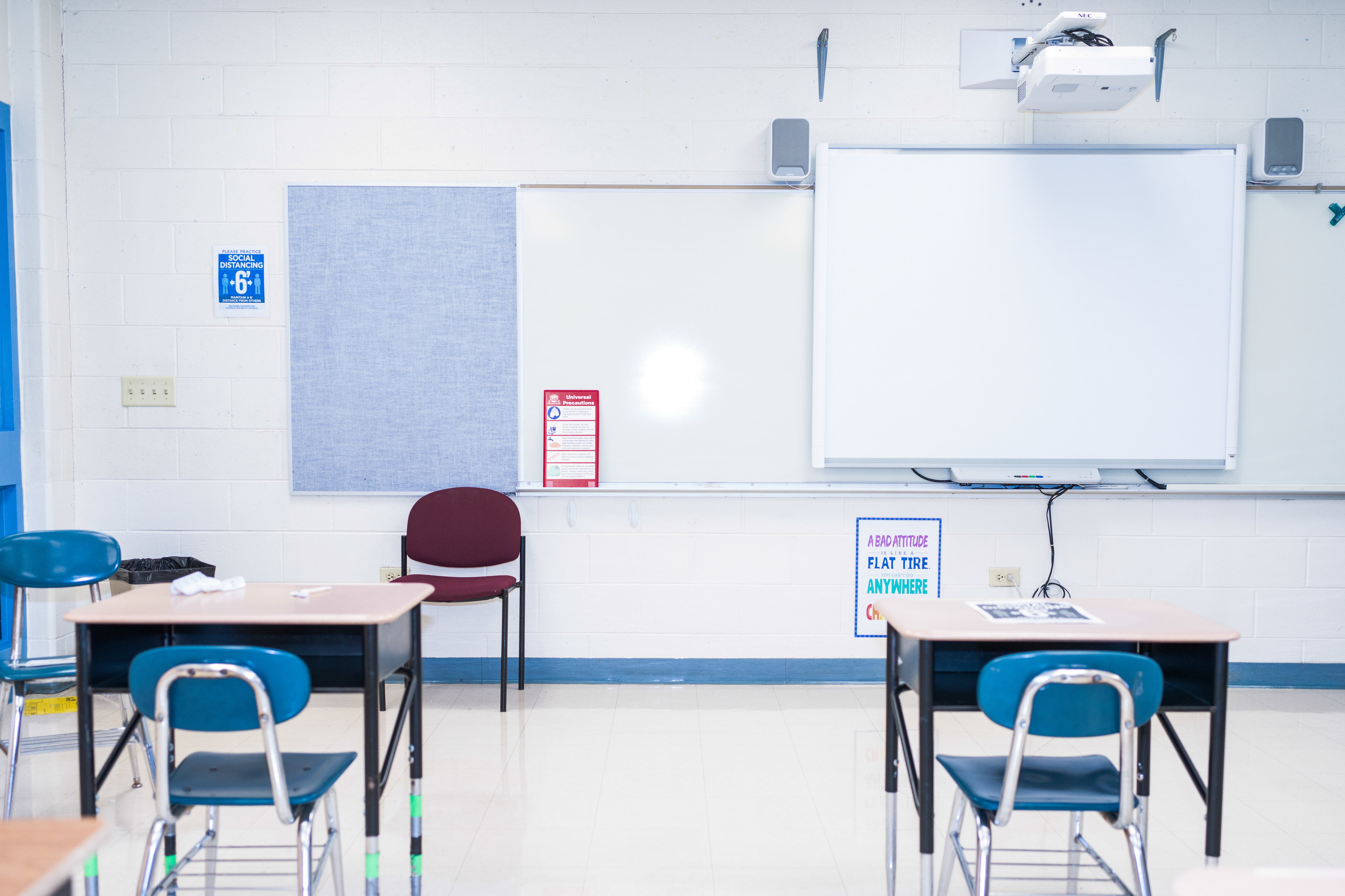 Empty desks and posters promoting social distancing at Lincoln Elementary in Dolton, Illinois, on Feb. 28, 2021.