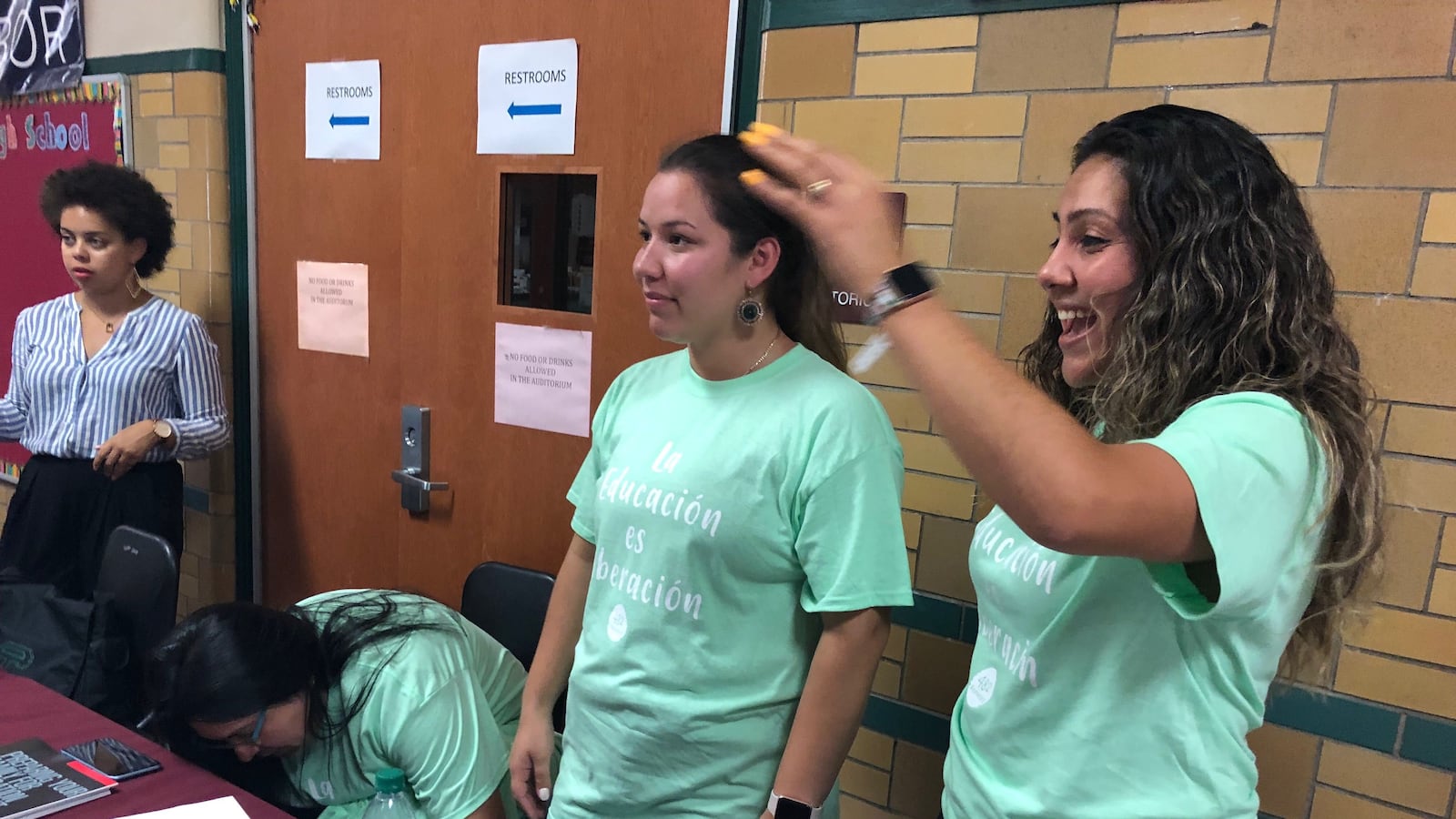 Cindy Gamboa, a Detroit parent and organizer for the Detroit Hispanic Development Corporation, welcomed families to an event at which the Detroit district rolled out a new sanctuary policy.