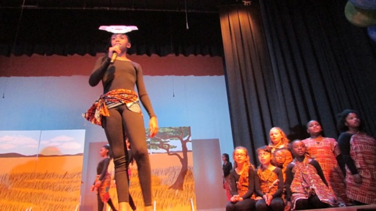 Destiney Rivers sings in a performance of songs from the musical The Lion King at the new Edison School for the Arts.