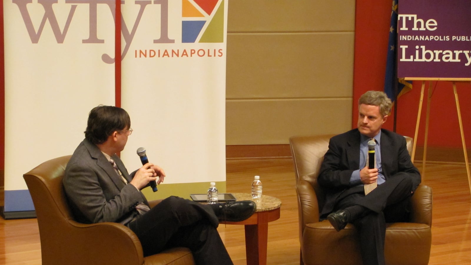 WFYI Education Reporter Eric Weddle talks to Civic Enterprises CEO John Bridgeland Tuesday at the Indianapolis Public Library about a new report on the national dropout problem.