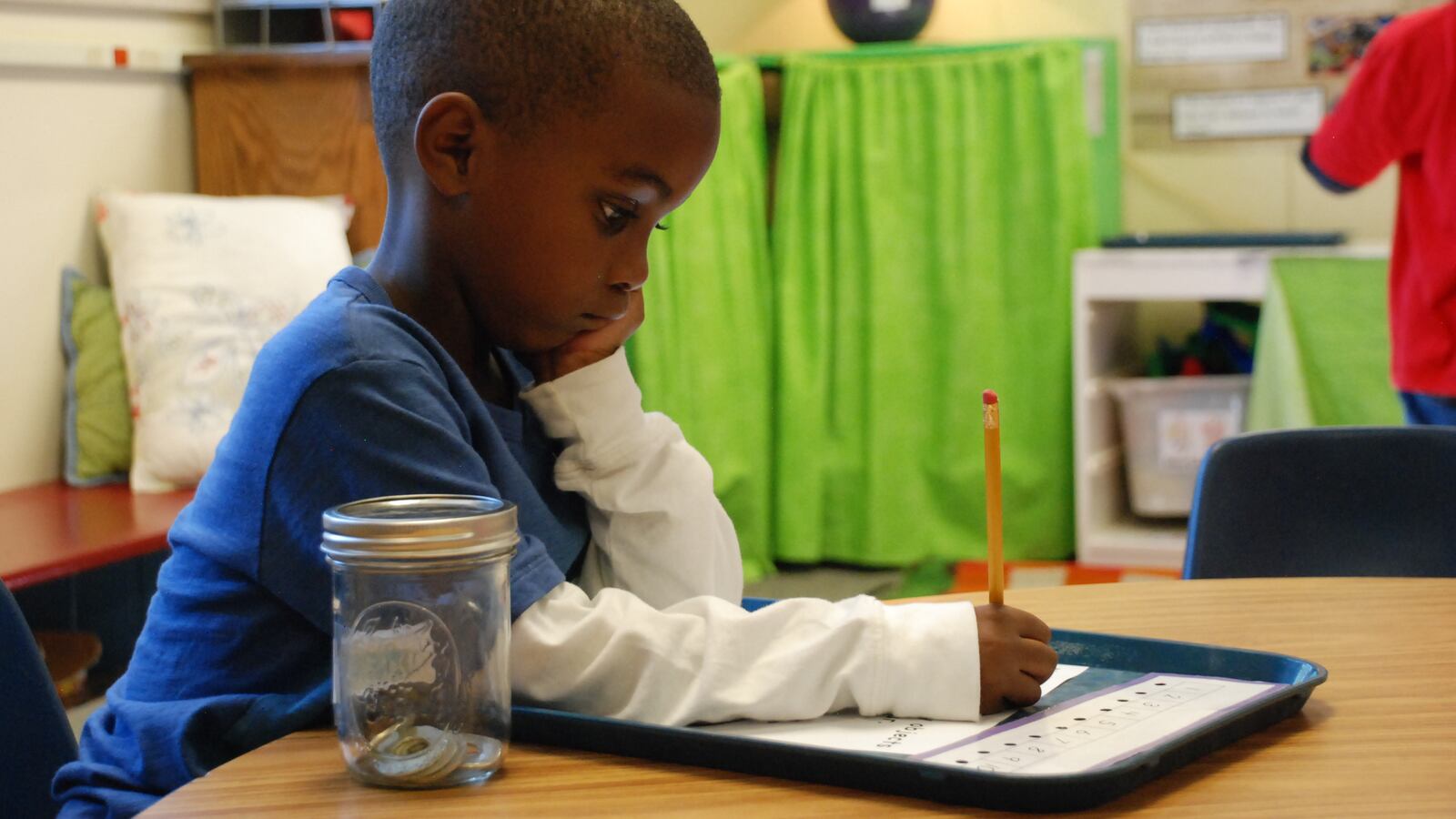 A student works at Tollgate Elementary School in Aurora. (Photo by Nic Garcia, Chalkbeat)